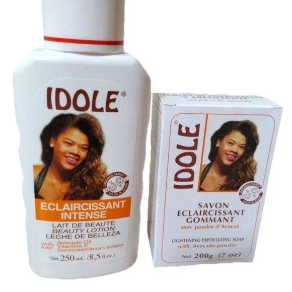 Idole Eclaircissant Intense beauty lotion and lightening exfoliating soap with avocado powder. White and orange packaging.